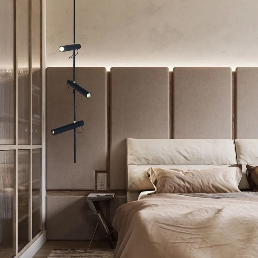 Industrial Style Spotlight Pendant Lamp hanging above a bed in a modern bedroom