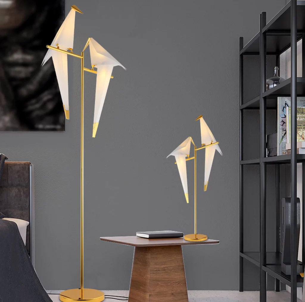 Perch Table  Floor Lamp with origami bird shaped lights in a modern room gold stand side table and shelf warm poetic glow