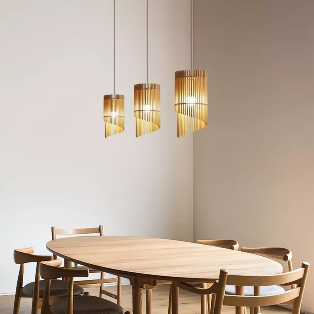 Wood Chime Pendant Light over dining table with three wooden shades warm ambient glow minimalist modern interior lighting fixture