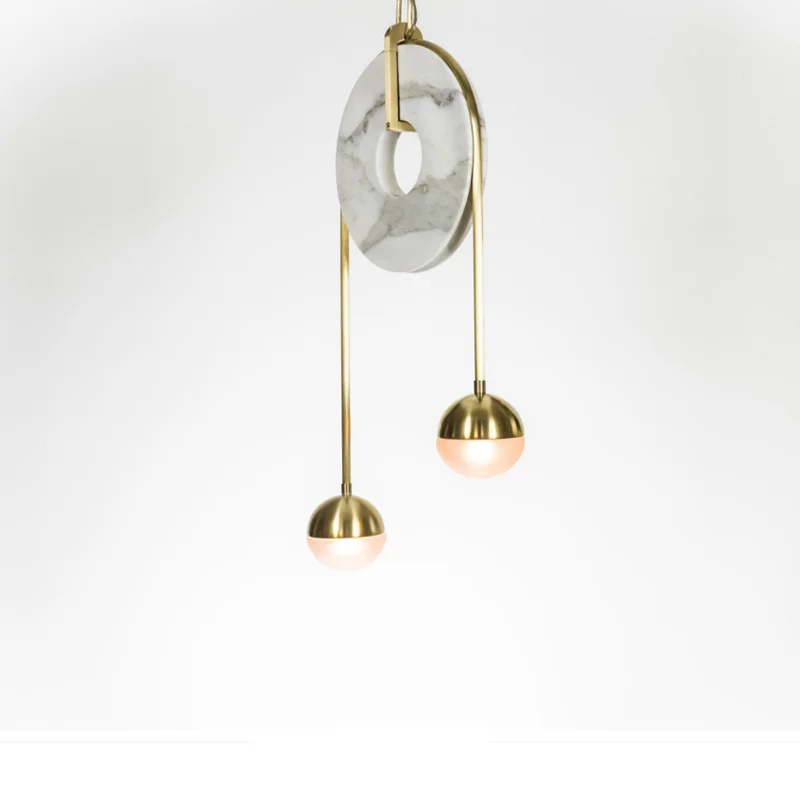 Curved branch LED statement pendant suspended from ceiling, featuring flowing organic lines, soft integrated lighting, and a sculptural focal point for modern interiors