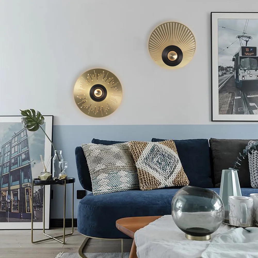 Round Shape LED Wall Lamp with a stylish gold finish, mounted on the wall above a modern sofa, adding a chic glow to the room.