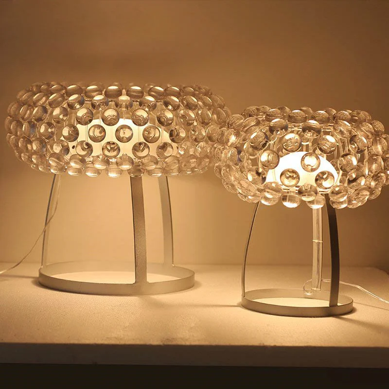 CABOCHE Table Lamps with glass shades, featuring clustered crystal spheres that create a warm, sparkling ambient glow.