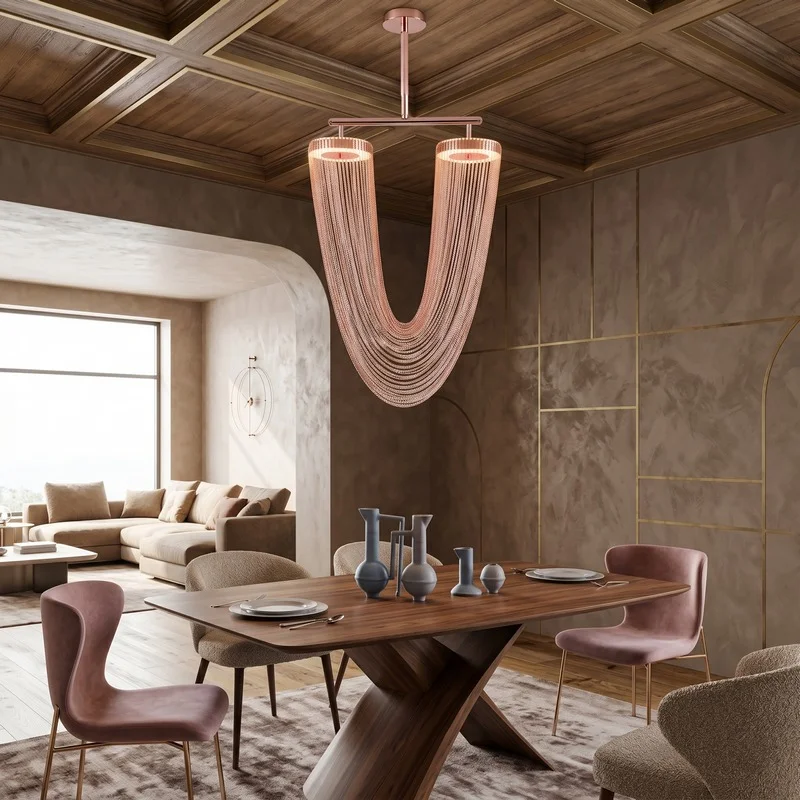 Modern dining room with a sculptural pink chandelier, wooden ceiling, and a large wooden table set for a meal.