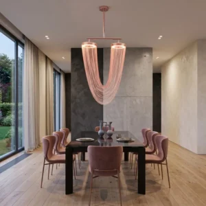 Contemporary dining room with a sculptural pink chandelier over a black glass table and pink upholstered chairs, set for a meal by large windows.