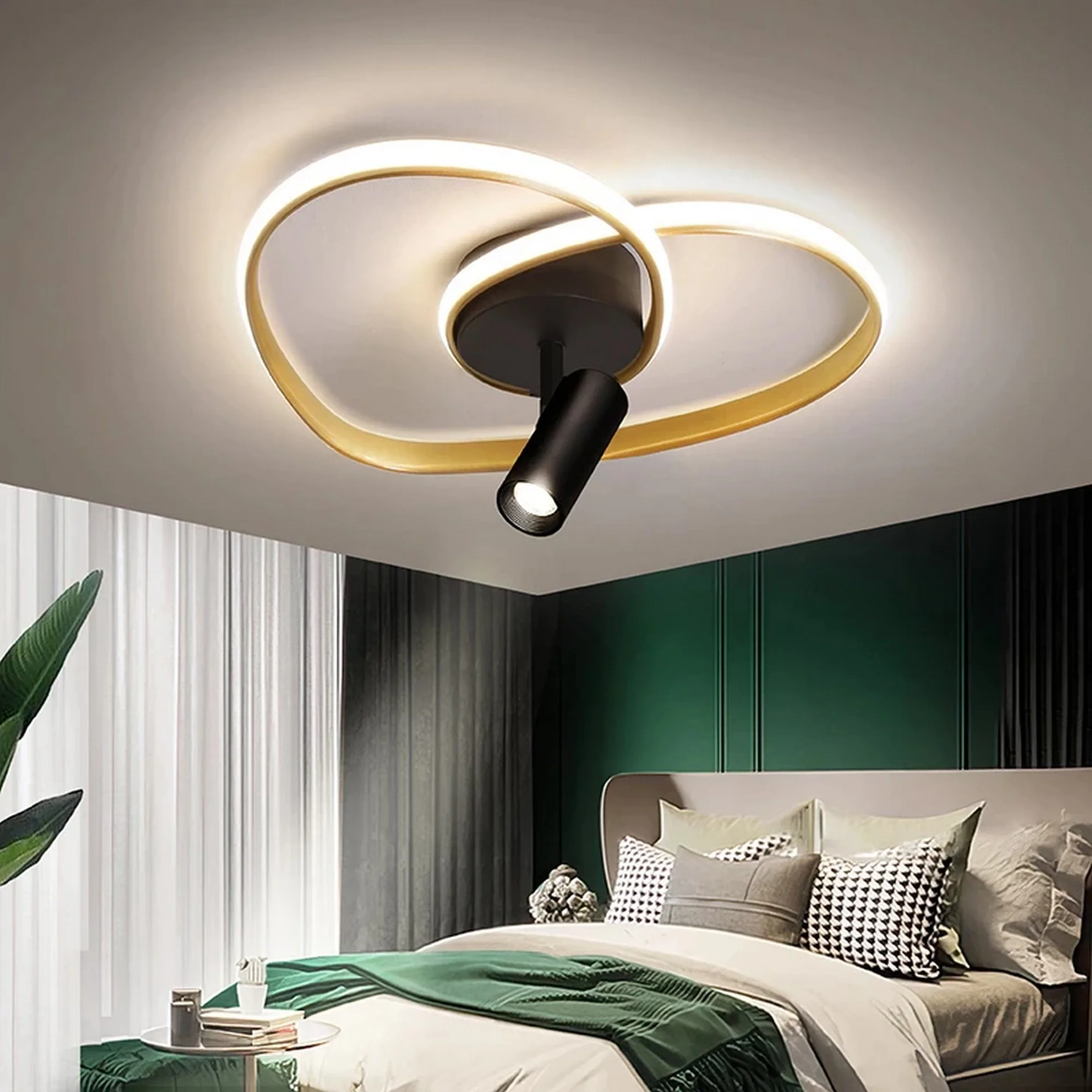 Heart Design Spotlight LED Ceiling Lamp with modern circular rings, warm glow, mounted above a stylish bedroom interior.