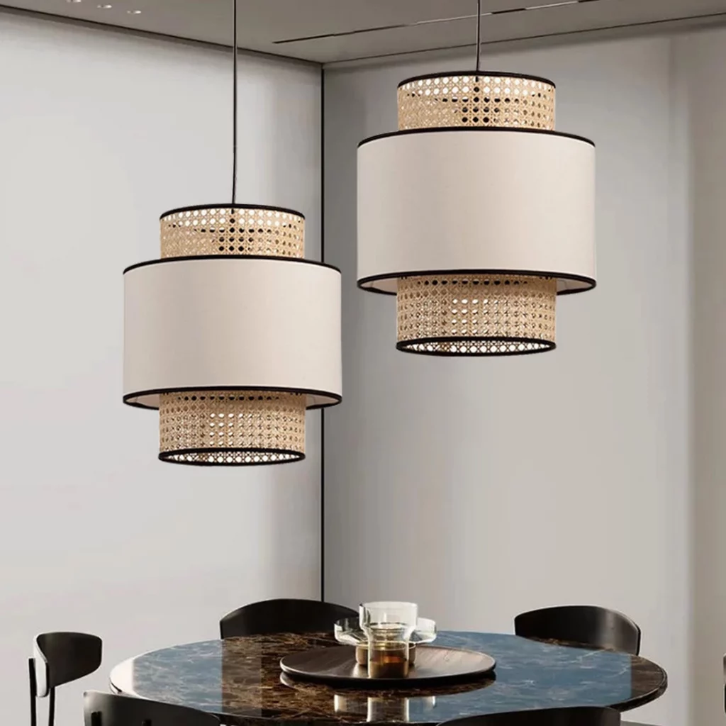 Japanese Style Rattan Woven Pendant Light above a dining table with layered woven and fabric shade design.