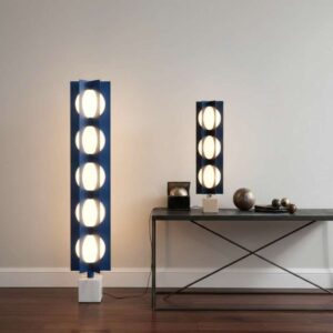 Cascade Tower Floor & Table Lamp set featuring two modern lamps with stacked circular lights and a sleek blue and white design on a metal table.