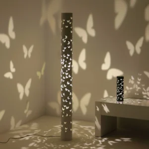 Kady Butterfly Projector Floor & Table Lamp set, casting intricate butterfly-shaped shadows on the walls, creating a dreamy atmosphere.